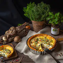 Une image de Quiche Pizza-Alpes : Recette avec Emmental, Reblochon, Brocoli - image générée par IA (DALL-E)
