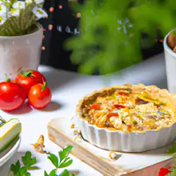 Une image de Quiche provençale au poulet et légumes - image générée par IA (DALL-E)
