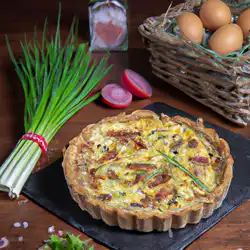 Une image de Quiche Savoyarde : Recette aux Lardons, Poireau et Reblochon - image générée par IA (DALL-E)