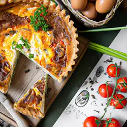 Une image de Quiche boeuf-tomate à la crème fraiche : recette inspirée des Ardennes - image générée par IA (DALL-E)