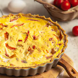 Une image de Quiche au reblochon et à la tomate sur pâte à pizza : une recette savoyarde revisitée - image générée par IA (DALL-E)